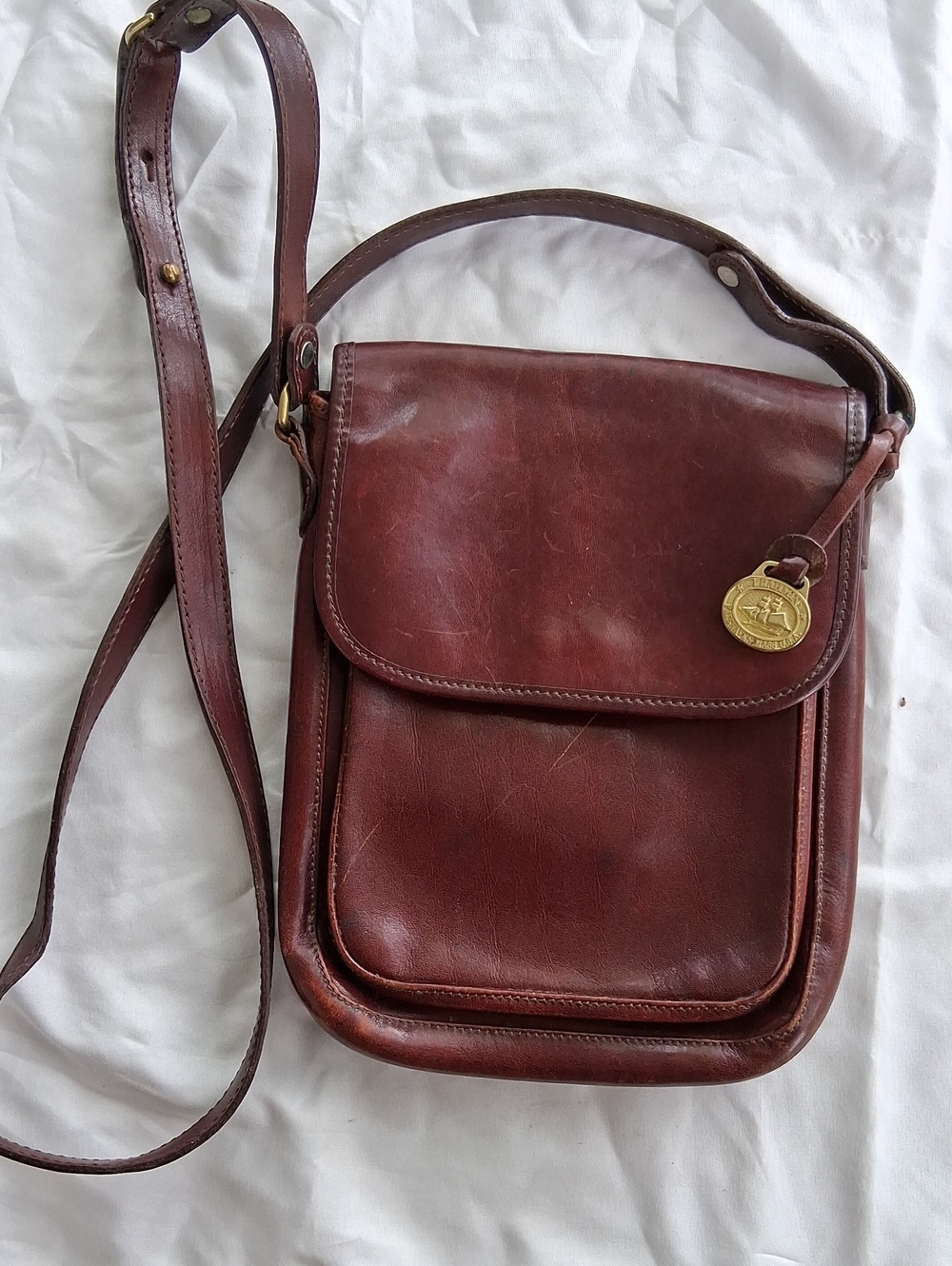 Brahmin Brown Leather Crossbody Bag with Gold Tone Medallion
